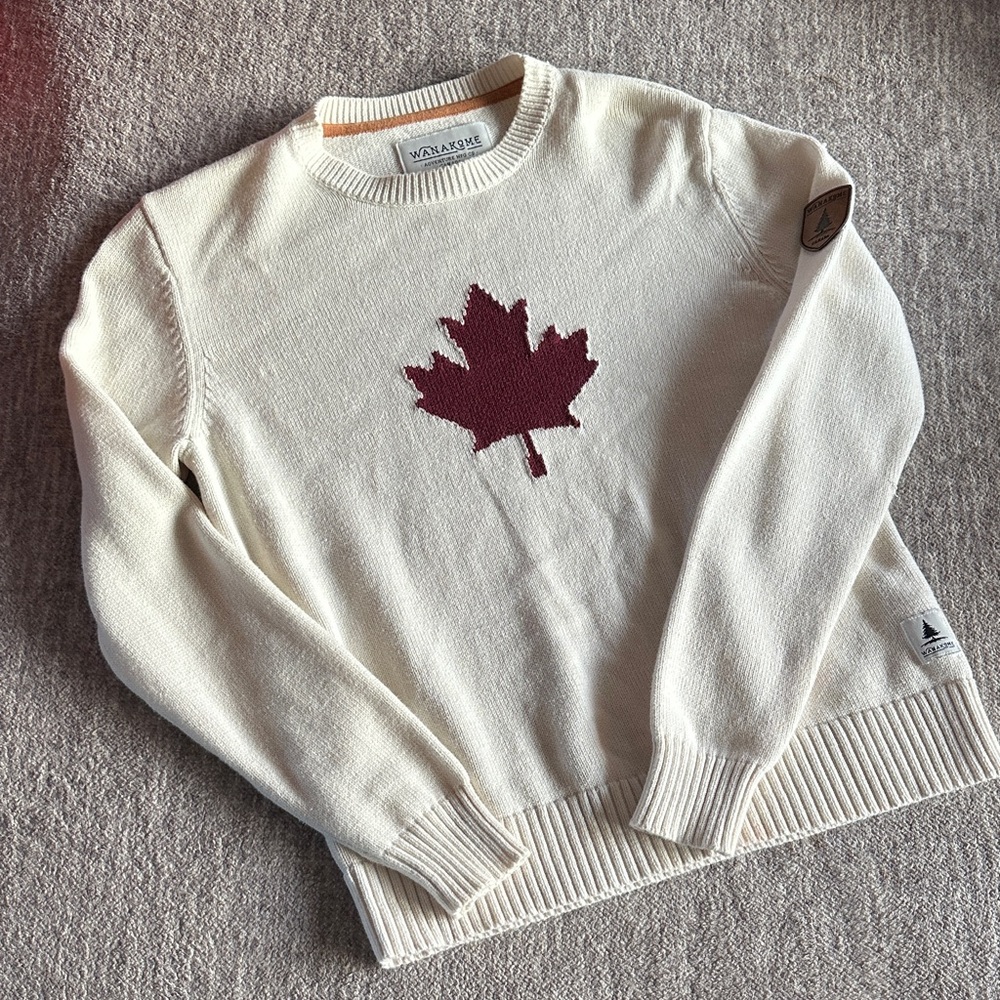 Wanakome Cream Sweater with Red Maple Leaf